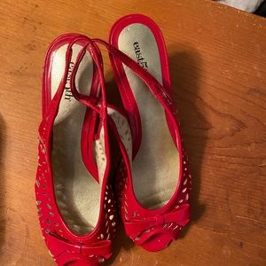 Red, high heel East 5th shoes.  Size 7